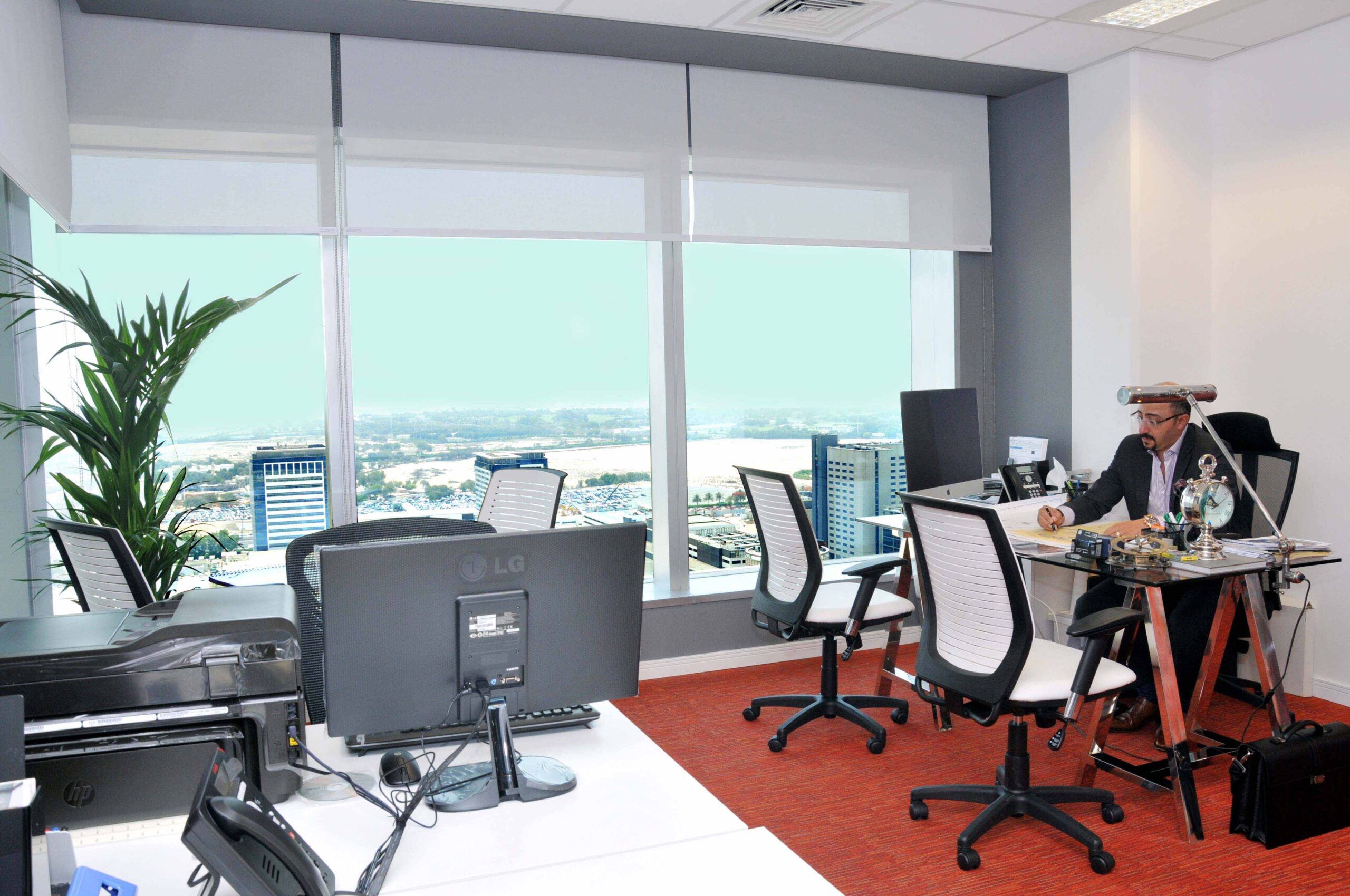 Contemporary shared office corridor with modern finishes and welcoming workspace design
