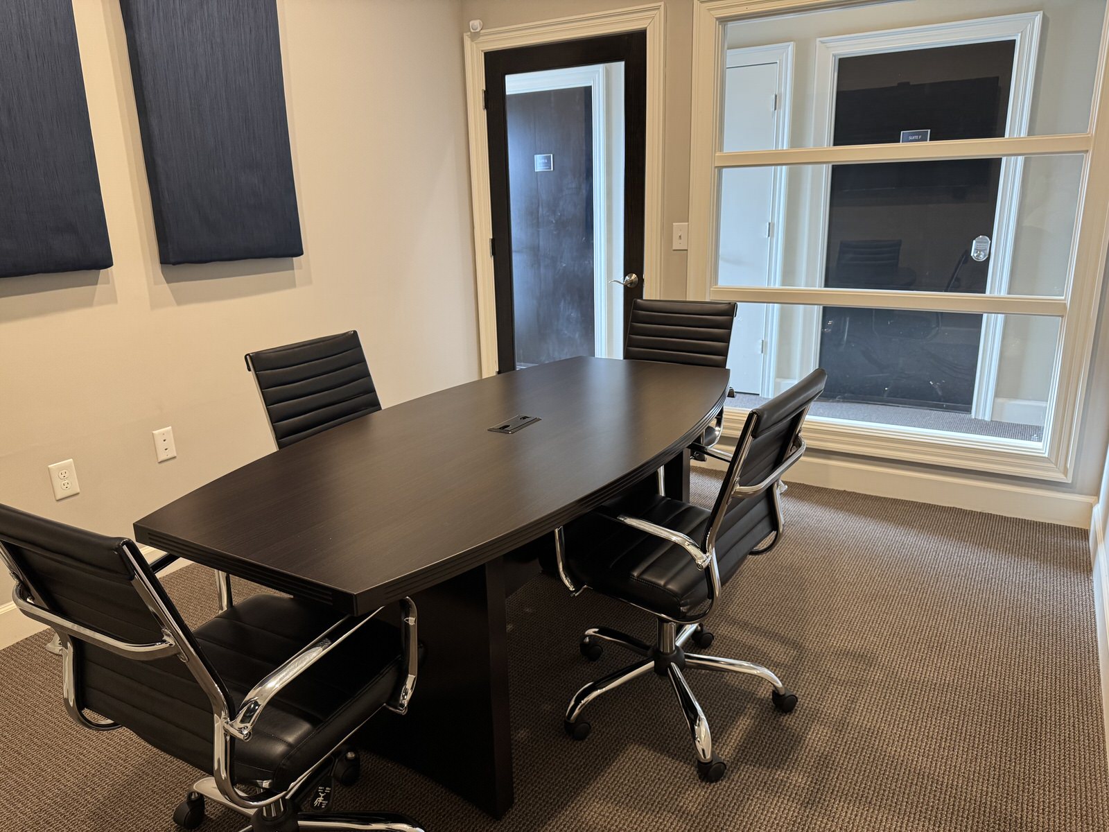 Business team reviewing workspace layouts and planning a productive office environment